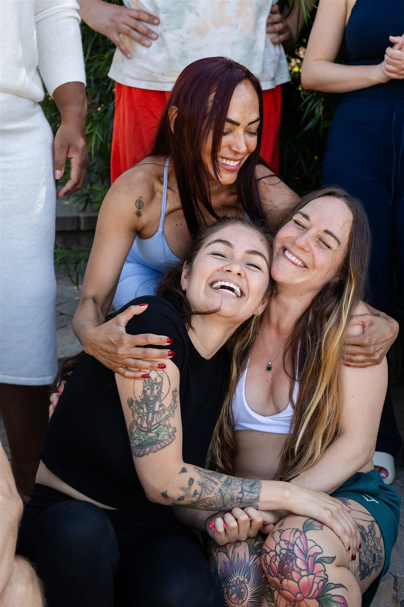Practitioners laughing together at LEEF House